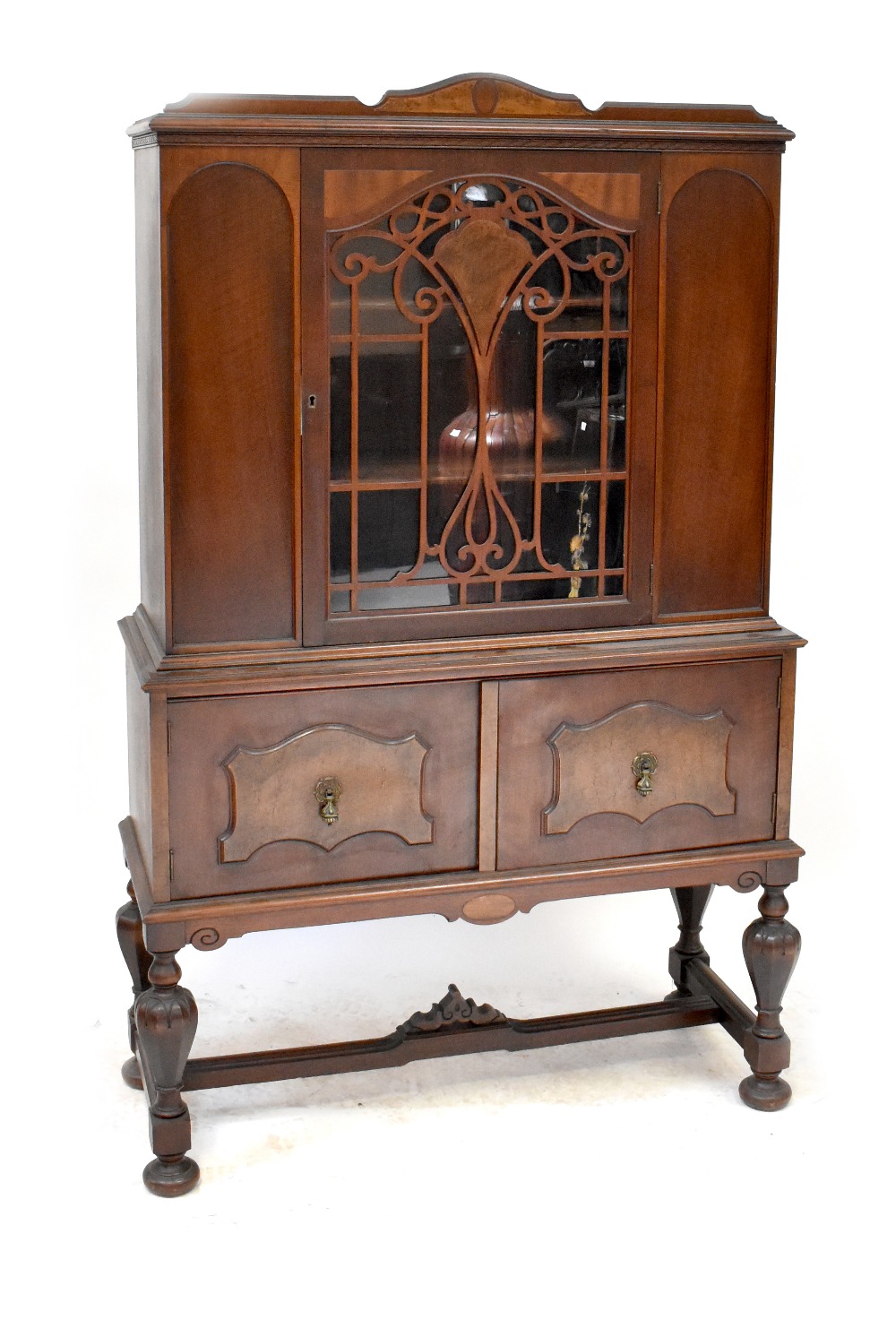 A reproduction sapele display cabinet,