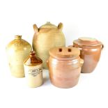 Five terracotta and stoneware pots to include a stoneware bottle for 'J. W.