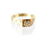 A vintage hallmarked 9ct gold illusion set diamond ring with chased double flower pattern to each