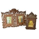 A large 20th century Burmese-style profusely carved double photo frame,
