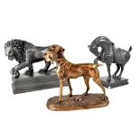 Three contemporary statues comprising a lion with front paw on a ball, length 31cm,