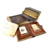 A 19th century musical family album, the album has a key-wound small Swiss music box to the back,