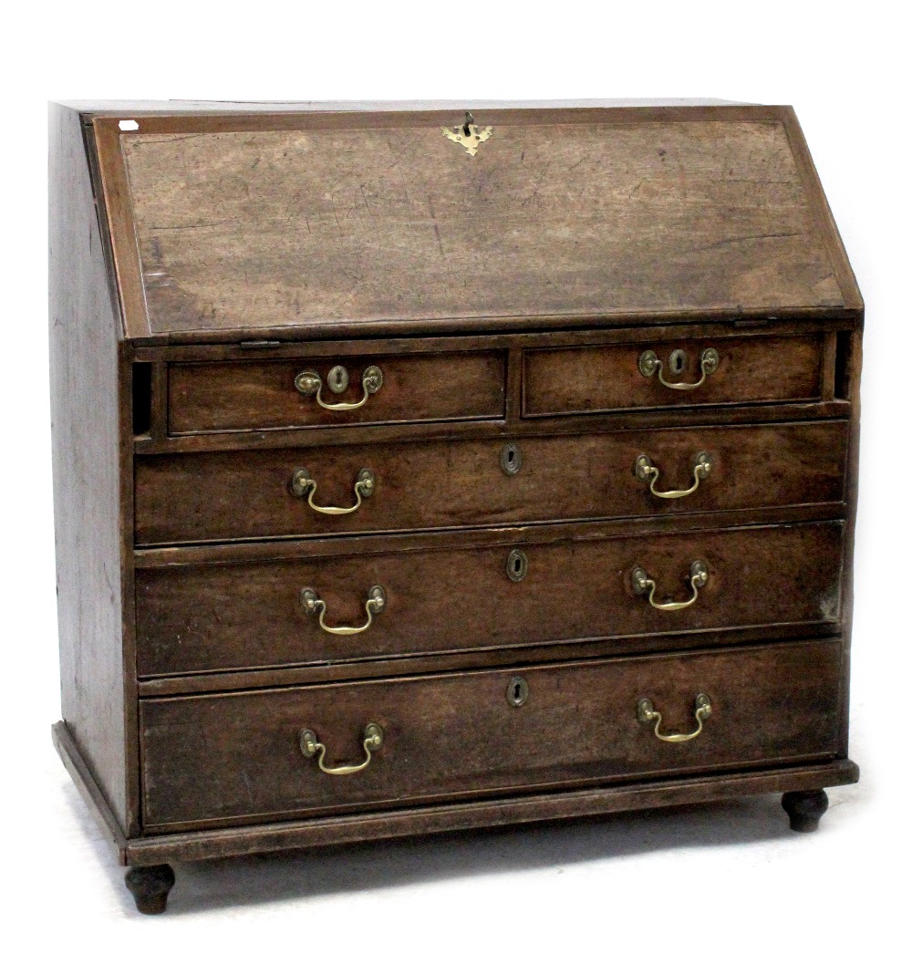 A George III mahogany bureau for restoration,