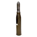A 1951 20PR MkI brass artillery shell case with projectile, length of case 61cm.