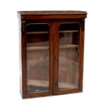 A top of a Victorian mahogany bureau bookcase, twin glazed doors with three interior shelves,