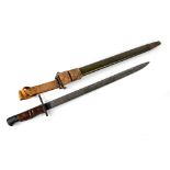 A Remington 1917 pattern military issued bayonet with original scabbard and leather frog,