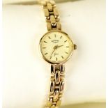 Rotary; a 9ct gold ladies' wristwatch, the circular dial set with baton numerals and marked 'Gold',