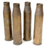 Four vintage brass artillery shell casings graded 20PR, all stamped '1964', two stamped 'APDS-T,