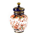 Royal Crown Derby; a baluster vase with cover in the Oriental style,