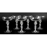 A set of ten Art Deco style Champagne bowls, stems in the form of a young naked woman (10).