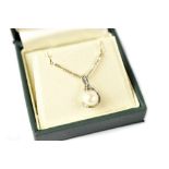 A 9ct white gold box link chain with cultured pearl set in 9ct white gold and tiny diamond set