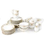 A Noritake 'Ireland' pattern dinner set comprising salt and pepper, milk, sugar,