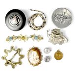 A collectors' lot comprising a white metal Dutch style compact, a gilt metal framed cameo brooch,