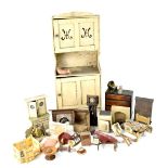 A quantity of c1950s dolls' house furniture to include small retro kitchen cupboard,