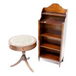 A reproduction mahogany drum table with tooled leather insert to top and two frieze drawers with