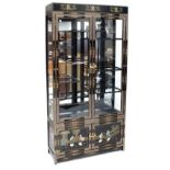 A modern Chinese black lacquer and Chinoiserie decorated display cabinet with a pair of glazed