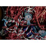 A quantity of corded curtain tie-back with silk and silk-effect tassels,