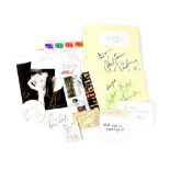 VARIOUS; a group of autographed ephemera including a photograph signed by Donna Karan,