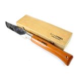A large cased Opinel shop counter display model N13 lock knife, length of the knife folded 28cm.