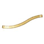 A 9ct gold reticulated brick link bracelet with brushed finish, fastened with push fit safety clasp,