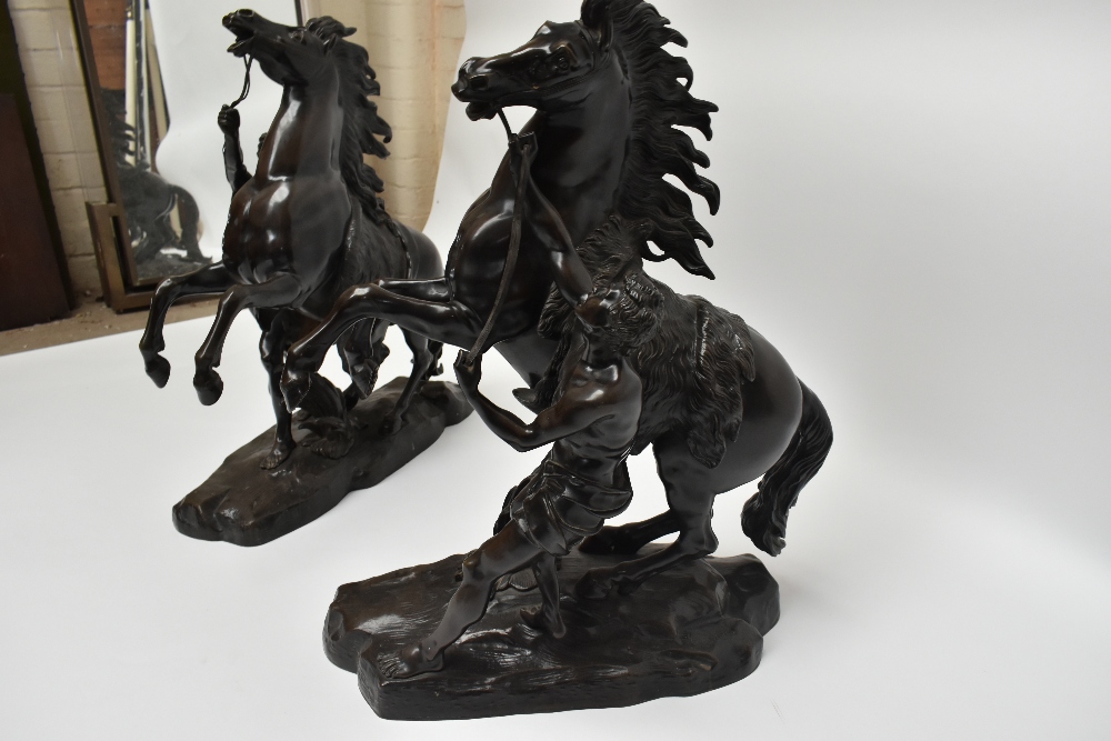 AFTER GUILLAUME COUSTOU; a very large pair of late 19th century bronze Marly horses, each bearing - Image 6 of 7