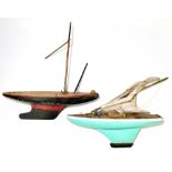 Two wooden models of pond yachts, length of largest 53cm.