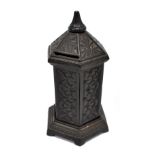 A Victorian cast iron novelty money bank of hexagonal form, impressed registration number 187026