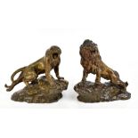 THOMAS FRANÇOIS CARTIER (1879-1943); a pair of late 19th/early 20th century bronze figures, lion and