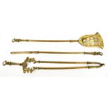 A set of three 19th century brass fire irons comprising poker, tongs and pierced shovel with urn