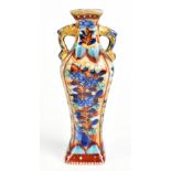 A small 19th century Chinese porcelain gilt and clobbered twin handled vase with red mark to