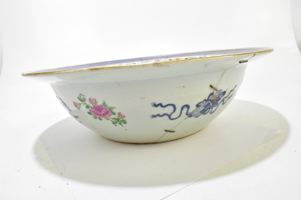 A large Chinese Canton Famille Rose bowl, painted with insects and floral sprays with gilt - Image 7 of 23