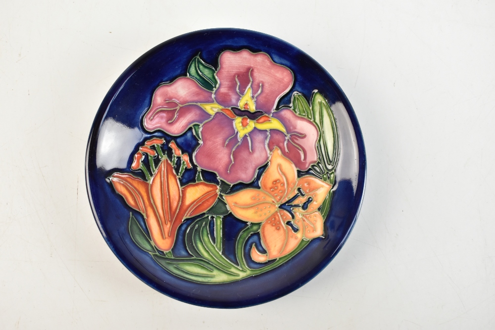 SALLY TUFFIN FOR MOORCROFT; a circular pin dish decorated with 'Finches' pattern on a green - Image 3 of 19