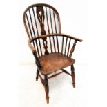 A mid-19th century ash and elm high hoop back Windsor-type elbow chair.Additional InformationSome of