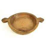 A rustic treen twin handled dairy bowl, diameter 69cm. Additional InformationThere are natural