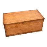 A late Victorian pine blanket box with hinged lid and twin side carrying handles, width 100cm.