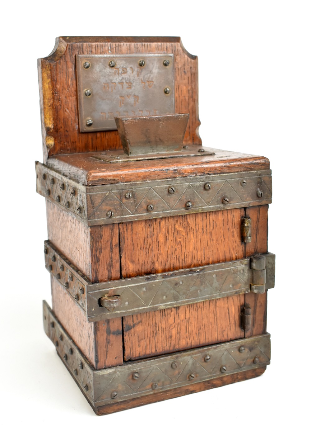 JUDAICA; a late 19th/early 20th century Tzedakah (charity) box, the oak body with iron frame and