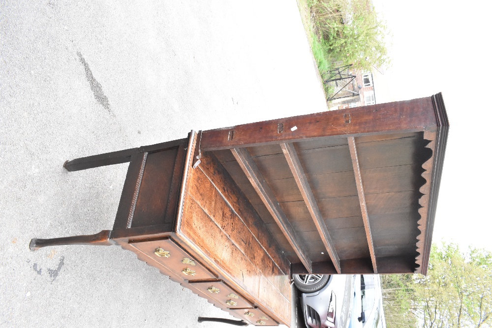 An 18th century oak dresser of low proportions, the plate rack back with carved and moulded - Image 6 of 6