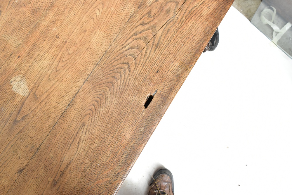 A late 19th century French oak two drawer writing table raised on chamfered square sectioned - Image 4 of 4
