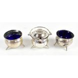 THOMAS BISHTON; an Edward VII hallmarked silver three piece condiment set, comprising lidded