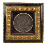 AFTER THE ANTIQUE; a modern bronzed plaque depicting a classical scene, in an ebonised and gilt