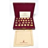 HALLMARK REPLICAS LTD; a cased limited edition set of sterling silver and gold plated 'stamps', with