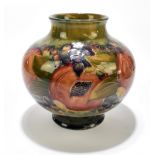 WILLIAM MOORCROFT FOR LIBERTY & CO; a bulbous vase decorated in the 'Pomegranate' pattern on an