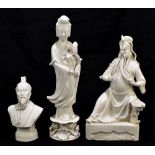 Three Chinese blanc de Chine Dehua-type figures comprising Guanyin, height 38cm, a warrior, height