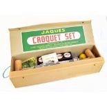 JAQUES & SON LTD; a boxed croquet set including mallets, balls, and hoops, with paperwork.Additional