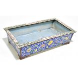 A 19th century Chinese Canton enamel jardinière of rectangular form, decorated with chrysanthemum,
