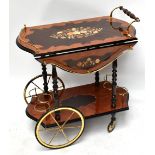A reproduction Italian marquetry effect drop leaf drinks trolley, height 78cm.