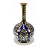 PILKINGTON'S ROYAL LANCASTRIAN: a vase of bulbous form with flared neck decorated with stylised