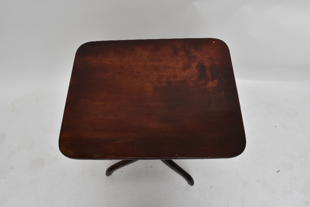 A George III oak tilt-top tripod occasional table with three-piece top above turned central column - Image 2 of 3