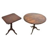 An 18th century oak circular tilt top table on tripod supports, height 70cm, diameter 80.3cm, and