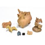 A group of Syro-Hittite terracotta animals including a zoomorphic jug in the form of a cow, circa